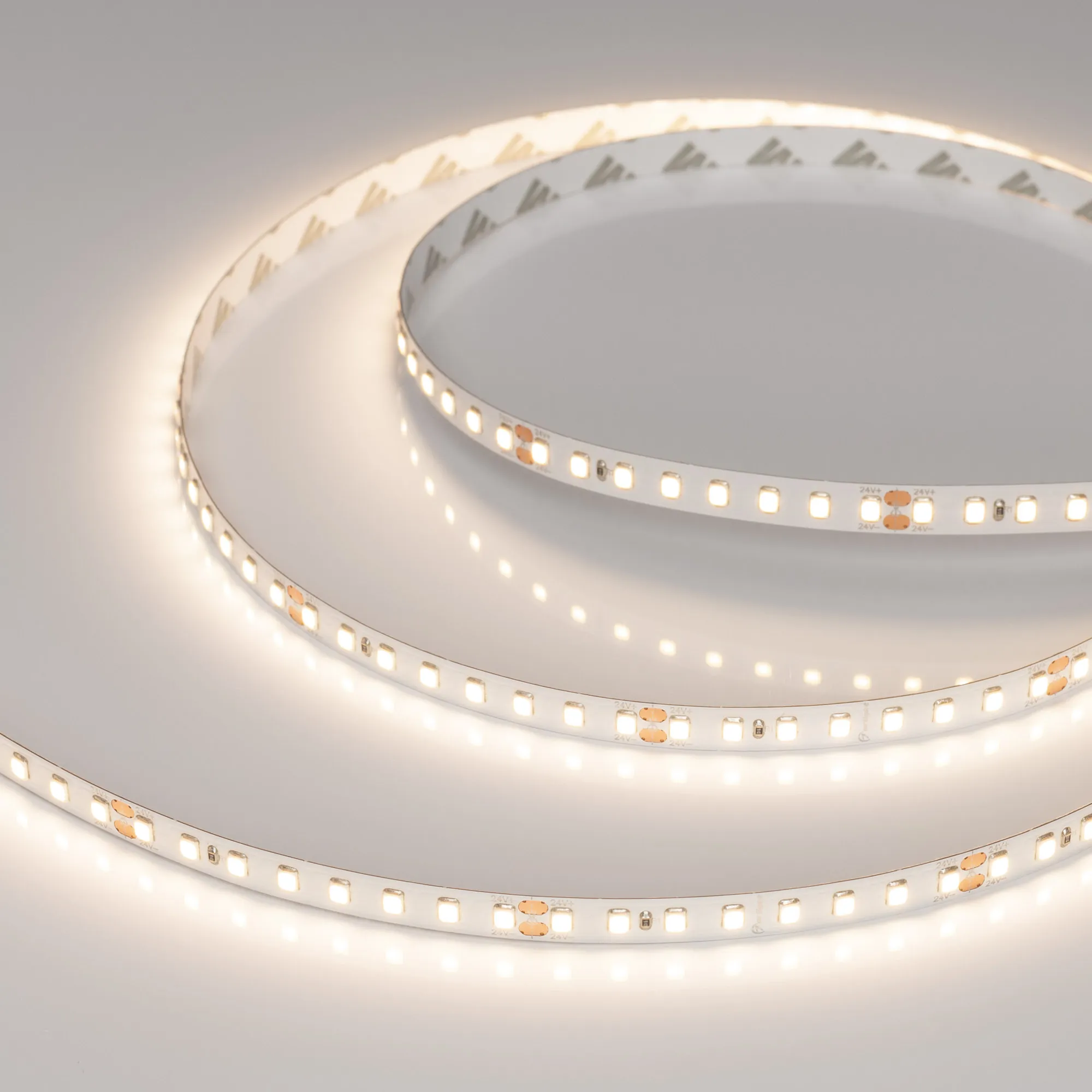 Лента RT-A128-8mm 24V Warm3500 (10 W/m, IP20, 5m) (Arlight, высок.эфф.150 лм/Вт) - изображение товара