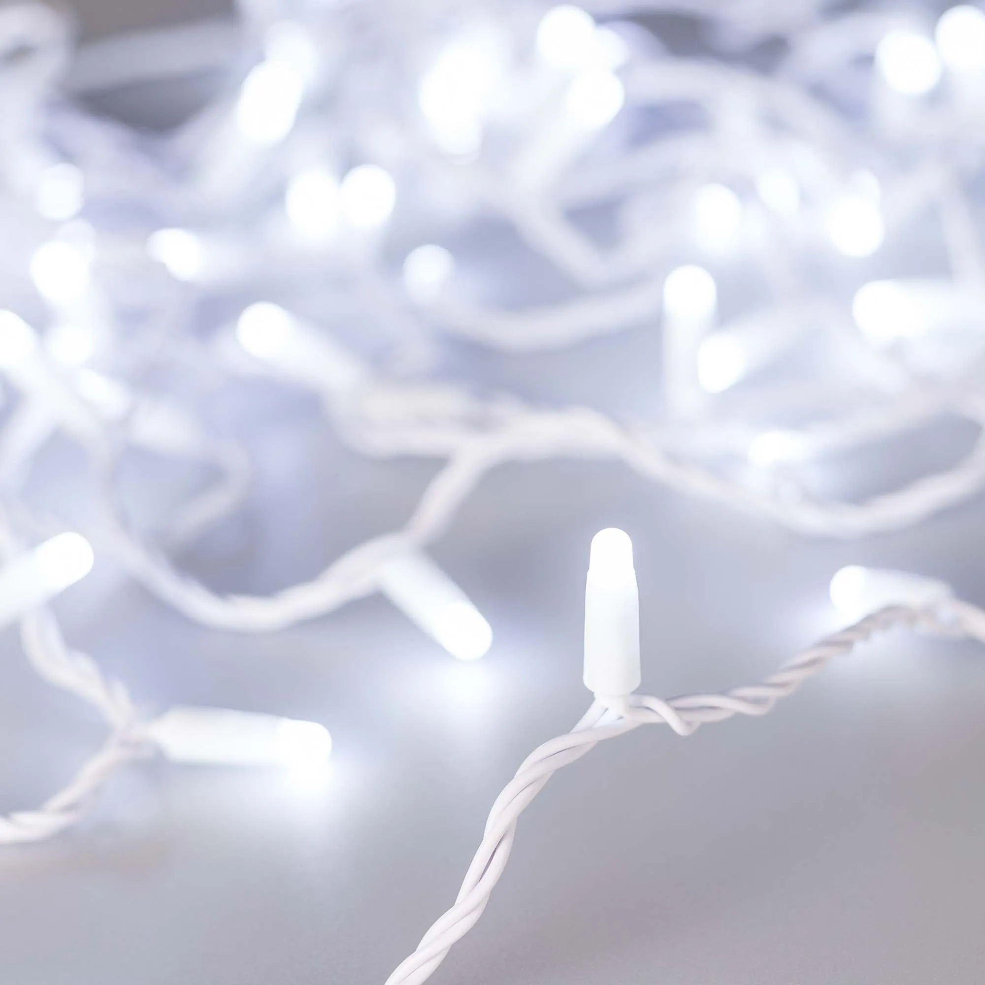 Светодиодная гирлянда ARD-STRING-CLASSIC-10000-WHITE-100LED-MILK-FLASH White (230V, 7W) (Ardecoled, IP65) - изображение товара